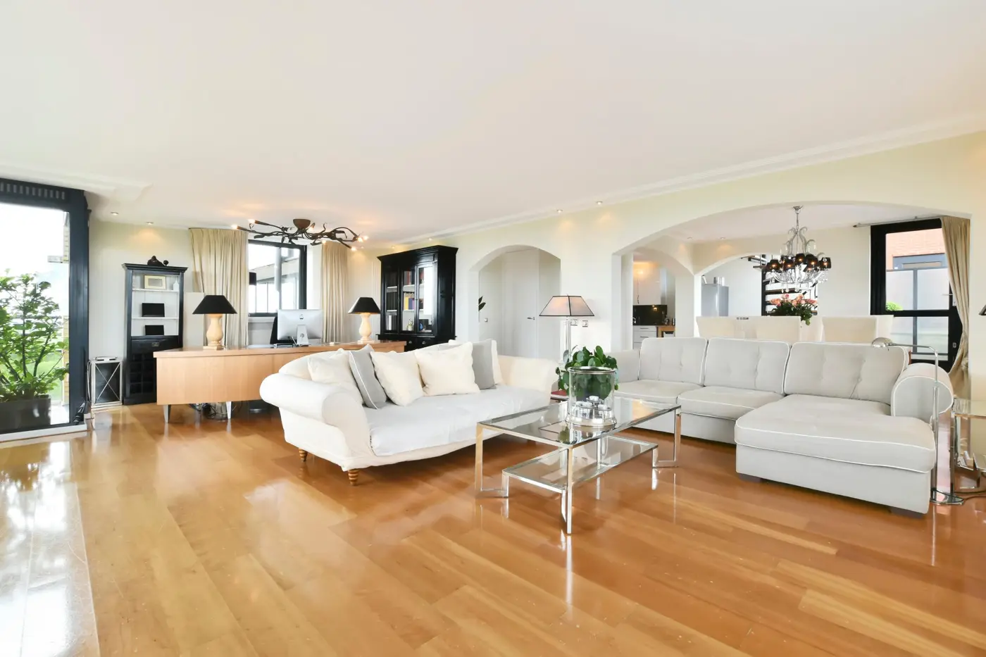 Bright living room with polished wood floor